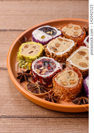 Turkish delight or lokum is a traditional Eastern sweet made with nuts. Turkish delight, lokum Turkish delight or lokum is a traditional Eastern sweet made with nuts. Turkish delight, lokum 142042525