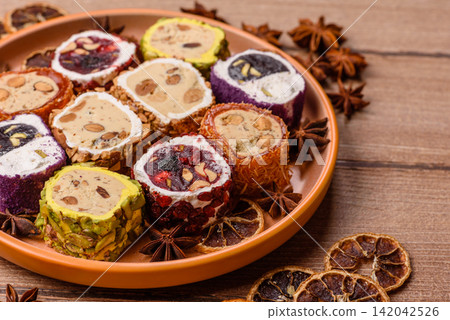 Turkish delight or lokum is a traditional Eastern sweet made with nuts. Turkish delight, lokum Turkish delight or lokum is a traditional Eastern sweet made with nuts. Turkish delight, lokum 142042526