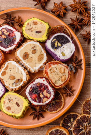 Turkish delight or lokum is a traditional Eastern sweet made with nuts. Turkish delight, lokum Turkish delight or lokum is a traditional Eastern sweet made with nuts. Turkish delight, lokum 142042527