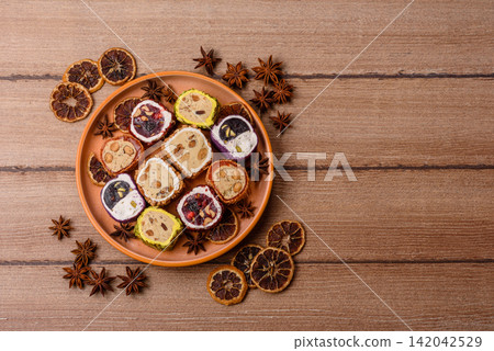 Turkish delight or lokum is a traditional Eastern sweet made with nuts. Turkish delight, lokum Turkish delight or lokum is a traditional Eastern sweet made with nuts. Turkish delight, lokum 142042529