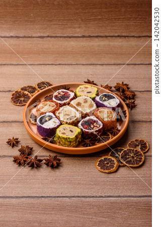 Turkish delight or lokum is a traditional Eastern sweet made with nuts. Turkish delight, lokum Turkish delight or lokum is a traditional Eastern sweet made with nuts. Turkish delight, lokum 142042530