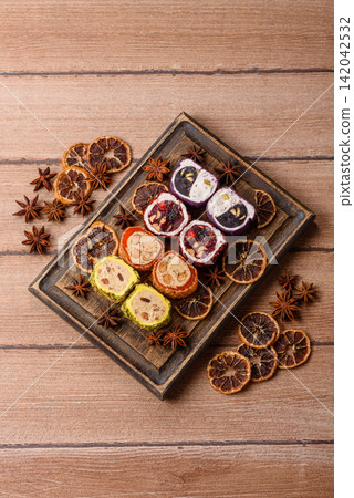 Turkish delight or lokum is a traditional Eastern sweet made with nuts. Turkish delight, lokum Turkish delight or lokum is a traditional Eastern sweet made with nuts. Turkish delight, lokum 142042532