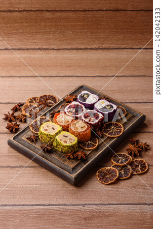 Turkish delight or lokum is a traditional Eastern sweet made with nuts. Turkish delight, lokum Turkish delight or lokum is a traditional Eastern sweet made with nuts. Turkish delight, lokum 142042533