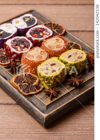 Turkish delight or lokum is a traditional Eastern sweet made with nuts. Turkish delight, lokum Turkish delight or lokum is a traditional Eastern sweet made with nuts. Turkish delight, lokum 142042538