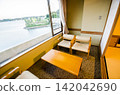 The view from the window of the veranda of a long-established inn. 142042690