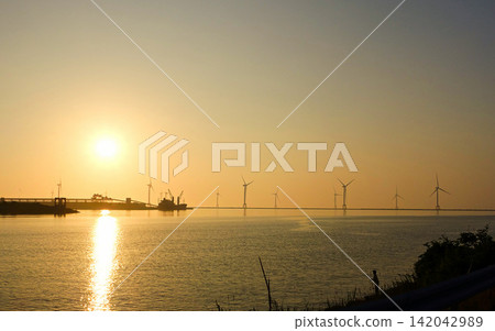 Ishikari Bay New Port: Windmills and Sunset Ishikari Bay New Port: Windmills and Sunset 142042989