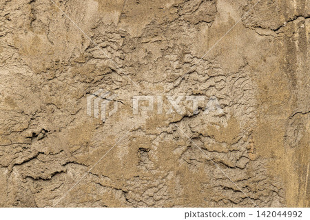 Rough Textured Sandy Wall Surface with Cracks Rough Textured Sandy Wall Surface with Cracks 142044992