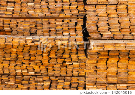 Large Stack of Cut Lumber Planks in Outdoor Setting Large Stack of Cut Lumber Planks in Outdoor Setting 142045016