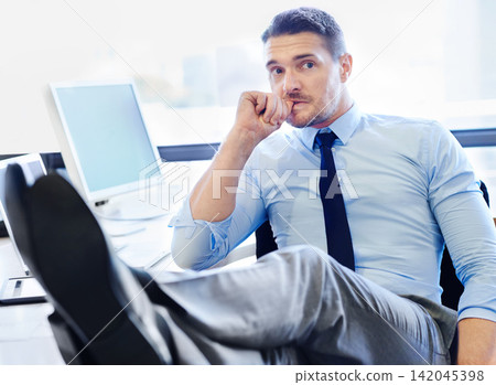 Businessman, thinking and tech in workplace with stress for corporate job, desk and feet up. Screen, executive and lawyer with nervous thoughts in office for web, shoes and anxiety for future career 142045398