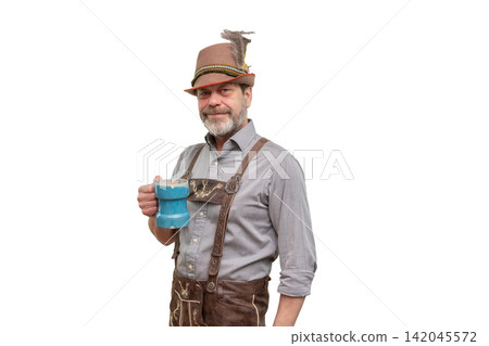 Smiling middle aged man in Bavarian costume holding blue tankard isolated Smiling middle aged man in Bavarian costume holding blue tankard isolated 142045572