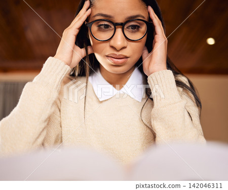 College student, stress and girl reading book in home for university, research or school education. Learning, anxiety and worried Indian woman with burnout or novel for studying academic information College student, stress and girl reading book in home for university, research or school education. Learning, anxiety and worried Indian woman with burnout or novel for studying academic information 142046311