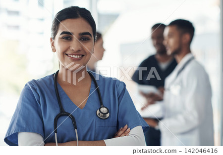 Portrait, confident nurse and happy woman in hospital for healthcare career, wellness and proud doctor. Face, smile and medical professional with arms crossed, surgeon or expert employee coworking Portrait, confident nurse and happy woman in hospital for healthcare career, wellness and proud doctor. Face, smile and medical professional with arms crossed, surgeon or expert employee coworking 142046416