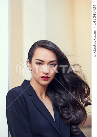 Asian woman, portrait and fashion suit with beauty or glamour outdoor for fancy event, confidence or style. Female person, face and serious or edgy with clothes blazer or classy party, trendy or cool Asian woman, portrait and fashion suit with beauty or glamour outdoor for fancy event, confidence or style. Female person, face and serious or edgy with clothes blazer or classy party, trendy or cool 142046424