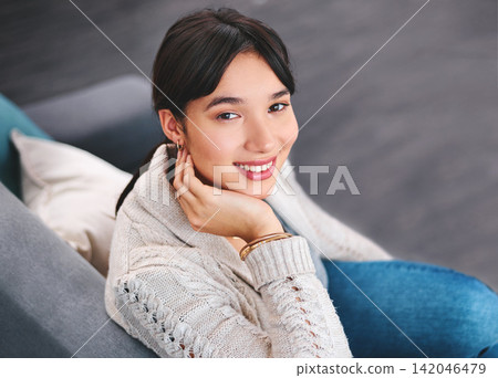 Woman, smile or portrait in living room couch for comfort, summer break and relaxing on weekend. Female person, happy and sitting on sofa with peace or confidence resting for wellness and home Woman, smile or portrait in living room couch for comfort, summer break and relaxing on weekend. Female person, happy and sitting on sofa with peace or confidence resting for wellness and home 142046479