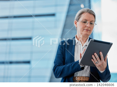 Mature businesswoman, tablet and career for online report, digital website or streaming in office. Professional person or manager and serious with tech for internet app and corporate success in job Mature businesswoman, tablet and career for online report, digital website or streaming in office. Professional person or manager and serious with tech for internet app and corporate success in job 142046606