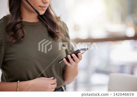 Businesswoman, hands and cellphone in office for reading message, browsing and texting online with contact. Workplace, technology or call agent with smartphone for networking, social media or scroll Businesswoman, hands and cellphone in office for reading message, browsing and texting online with contact. Workplace, technology or call agent with smartphone for networking, social media or scroll 142046659