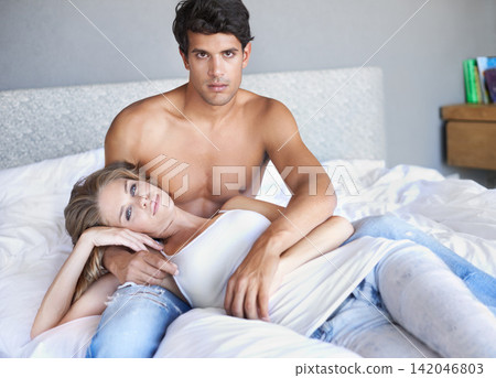 Couple, relax and love in bed portrait, cozy and romance bonding in home for relationship. People, commitment and security in marriage connection, care and support in hotel on vacation or holiday Couple, relax and love in bed portrait, cozy and romance bonding in home for relationship. People, commitment and security in marriage connection, care and support in hotel on vacation or holiday 142046803
