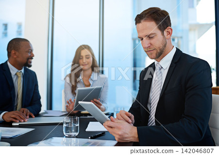 Online, lawyer or businessman on tablet at law firm for consulting, legal research or corporate case. Staff,, meeting or attorney on technology for schedule update, news or feedback review in office Online, lawyer or businessman on tablet at law firm for consulting, legal research or corporate case. Staff,, meeting or attorney on technology for schedule update, news or feedback review in office 142046807