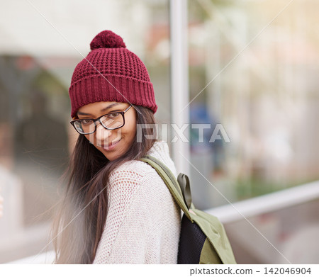 Girl, student and smile with backpack at university or campus for education, teaching and learning. Portrait, teen and happy with glasses at college with break from school work, study and revision Girl, student and smile with backpack at university or campus for education, teaching and learning. Portrait, teen and happy with glasses at college with break from school work, study and revision 142046904