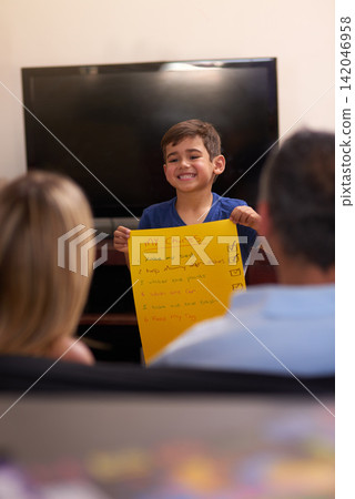 Child, home and chore list with smile by parents back for housekeeping, responsibility or learn. Boy, happy and learning cleaning for independence or routine for pocket money, helping or schedule Child, home and chore list with smile by parents back for housekeeping, responsibility or learn. Boy, happy and learning cleaning for independence or routine for pocket money, helping or schedule 142046958