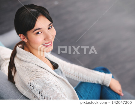 Woman, smile or portrait on couch in home for comfort, summer break and relaxing on weekend. Female person, happy and sitting on sofa with peace or confidence resting for wellness and leisure Woman, smile or portrait on couch in home for comfort, summer break and relaxing on weekend. Female person, happy and sitting on sofa with peace or confidence resting for wellness and leisure 142047200