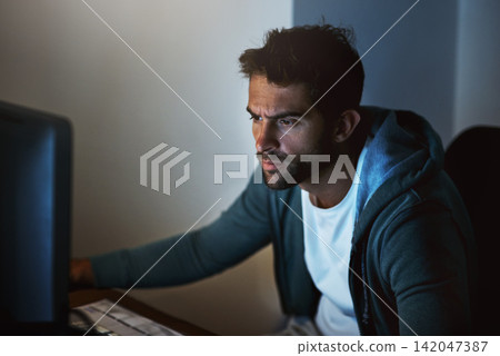 Computer, man or hacker thinking at night of cyber security, programming or digital network safety. Male person, technology or pc in home planning internet crimes for malware, phishing and ransomware Computer, man or hacker thinking at night of cyber security, programming or digital network safety. Male person, technology or pc in home planning internet crimes for malware, phishing and ransomware 142047387