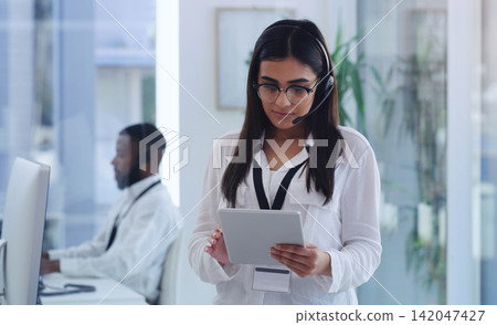 Call center, tablet and woman in office with headset for customer service, research and support. Consultant, company and person with digital technology for communication, telemarketing and networking Call center, tablet and woman in office with headset for customer service, research and support. Consultant, company and person with digital technology for communication, telemarketing and networking 142047427