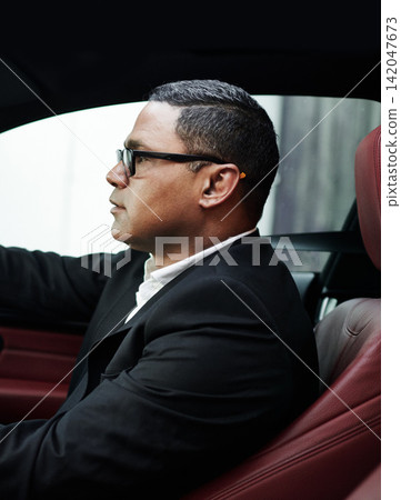 Profile, gentleman and entrepreneur in a luxury car, rich person and wealthy with morning commute and travel. Transportation, business and glasses with success and corporate professional with vehicle 142047673