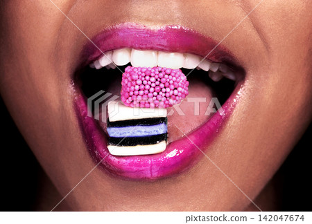 Eating, candy and woman with makeup for mouth, color and lipstick closeup. Skin, shine and girl with liquorice for beauty with sweet treat for cosmetics, aesthetic and luxury food with lips color 142047674