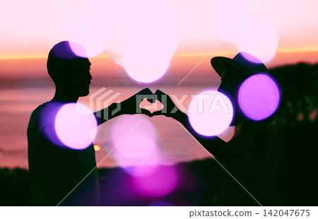 Sunset sky, bokeh and silhouette of couple with heart hand, emoji and light on romantic outdoor date. Love sign, man and woman with care, affection and relationship support on evening travel holiday. 142047675