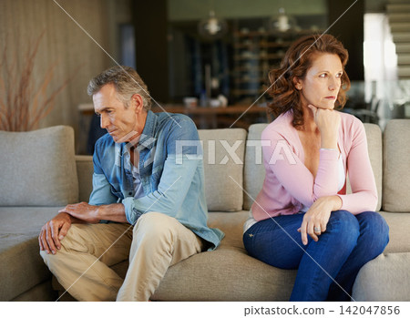 Marriage, problem and mature couple in counseling for fight with stress, angry partner thinking of divorce. Relationship, therapy and people with conflict or bad communication in mental health crisis Marriage, problem and mature couple in counseling for fight with stress, angry partner thinking of divorce. Relationship, therapy and people with conflict or bad communication in mental health crisis 142047856