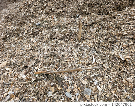 Shredded Wood Chips Blend Creating a Textured Earth Tone Landscape Shredded Wood Chips Blend Creating a Textured Earth Tone Landscape 142047901