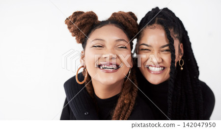Lesbian couple, portrait and fashion in studio with hug for style inspiration, happiness and love together. Serious, lgbt and black people with embrace for support, relationship and braids with smile Lesbian couple, portrait and fashion in studio with hug for style inspiration, happiness and love together. Serious, lgbt and black people with embrace for support, relationship and braids with smile 142047950