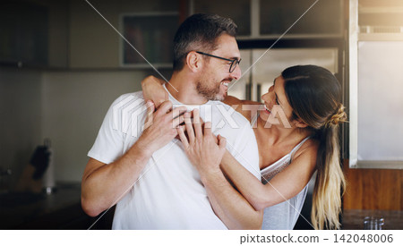 Love, hug and happy couple in home together with care, kindness and support in morning. Marriage, man and woman in romantic embrace with smile, connection and security in relationship in apartment Love, hug and happy couple in home together with care, kindness and support in morning. Marriage, man and woman in romantic embrace with smile, connection and security in relationship in apartment 142048006