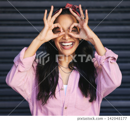 Excited, smile and woman with hands for okay sign, urban fashion and laugh at garage door. Happiness, gen z female person and streetwear with perfect gesture, confident and emoji on dark background Excited, smile and woman with hands for okay sign, urban fashion and laugh at garage door. Happiness, gen z female person and streetwear with perfect gesture, confident and emoji on dark background 142048177