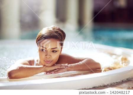 Thinking, woman and relax in pool on holiday, break and luxury with mindfulness. Female person, jacuzzi and memories or thoughts on vacation, trip and travel at hotel or resort for swimming and fun Thinking, woman and relax in pool on holiday, break and luxury with mindfulness. Female person, jacuzzi and memories or thoughts on vacation, trip and travel at hotel or resort for swimming and fun 142048217