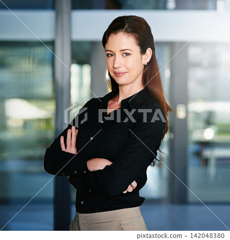 Portrait, professional and business woman with pride in office, smile or positive attitude. Content editor, face and female person with arms crossed, ambition and employee for journalism career Portrait, professional and business woman with pride in office, smile or positive attitude. Content editor, face and female person with arms crossed, ambition and employee for journalism career 142048380
