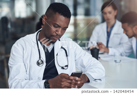 Man, phone and doctor with typing in hospital for telehealth, healthcare research or service. Medical professional, clinic and person with smartphone for digital consulting, online network or website Man, phone and doctor with typing in hospital for telehealth, healthcare research or service. Medical professional, clinic and person with smartphone for digital consulting, online network or website 142048454