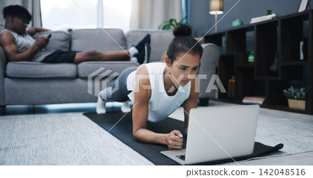 Home, exercise and woman with laptop, fitness and man on couch with internet and wellness. Apartment, athlete and girl with online workout routine and technology for training for health and challenge Home, exercise and woman with laptop, fitness and man on couch with internet and wellness. Apartment, athlete and girl with online workout routine and technology for training for health and challenge 142048516