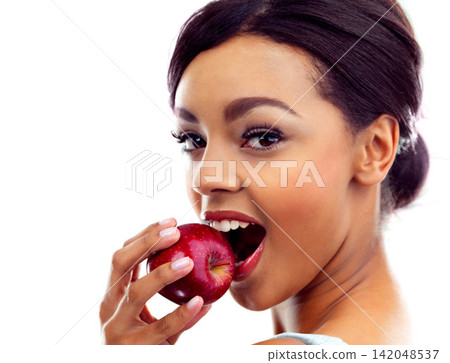 Woman, portrait and apples for healthy diet, wellness and natural eating with detox in studio. Vegetarian, balance and fruit on white background with mockup for organic food, nutrition and benefits Woman, portrait and apples for healthy diet, wellness and natural eating with detox in studio. Vegetarian, balance and fruit on white background with mockup for organic food, nutrition and benefits 142048537