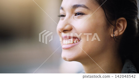 Happy, smile and headshot of Asian woman outdoor in city, urban town and street with blurry background in China. Excited, student and closeup of gen z girl with vision for freedom, calm and relax 142048542