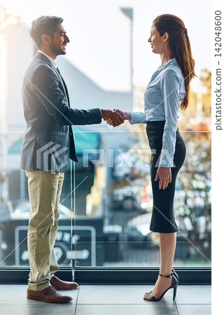 Business people, office and shaking hands for introduction, hello and welcome to job interview in human resources. Woman, clients or candidate shaking hands for hiring, deal and onboarding or success Business people, office and shaking hands for introduction, hello and welcome to job interview in human resources. Woman, clients or candidate shaking hands for hiring, deal and onboarding or success 142048600