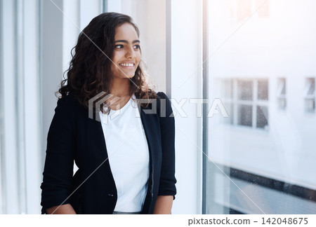 Woman, window and thinking of business ideas for future in career, planning or brainstorming with smile. Inspiration, insight and problem solving for solution and decision with professional goals Woman, window and thinking of business ideas for future in career, planning or brainstorming with smile. Inspiration, insight and problem solving for solution and decision with professional goals 142048675