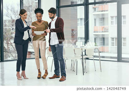Office, group and tablet with notes, teamwork and discussion for b2b report or project. Man, women and communication for collaboration, partnership and small business meeting with planning staff Office, group and tablet with notes, teamwork and discussion for b2b report or project. Man, women and communication for collaboration, partnership and small business meeting with planning staff 142048749