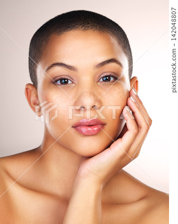 Skincare, beauty and portrait of woman in studio for natural, cosmetic and facial treatment. Confident, health and female model with wellness and face dermatology routine isolated by white background Skincare, beauty and portrait of woman in studio for natural, cosmetic and facial treatment. Confident, health and female model with wellness and face dermatology routine isolated by white background 142048807