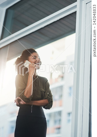 Phone call, window and business black woman in office for online conversation, contact and talking. Corporate consultant, company and worker on smartphone for communication, b2b network or connection Phone call, window and business black woman in office for online conversation, contact and talking. Corporate consultant, company and worker on smartphone for communication, b2b network or connection 142048833