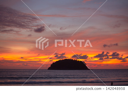 aerial view colorful cloud above the island at sunset. aerial view colorful cloud above the island at sunset. 142048938