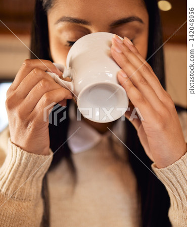 Girl, home and drink coffee in morning for daily routine to start day for peace and mindfulness or stress relief. Woman, cup and herbal green tea in house for breakfast to relax, calm and closeup. Girl, home and drink coffee in morning for daily routine to start day for peace and mindfulness or stress relief. Woman, cup and herbal green tea in house for breakfast to relax, calm and closeup. 142048956