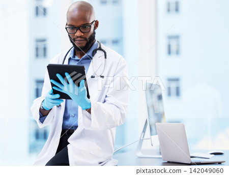 Healthcare, tablet or black man doctor in office for research, planning or hospital faq. Help, stethoscope or cardiovascular surgeon with digital communication, consulting or Telehealth service app Healthcare, tablet or black man doctor in office for research, planning or hospital faq. Help, stethoscope or cardiovascular surgeon with digital communication, consulting or Telehealth service app 142049060