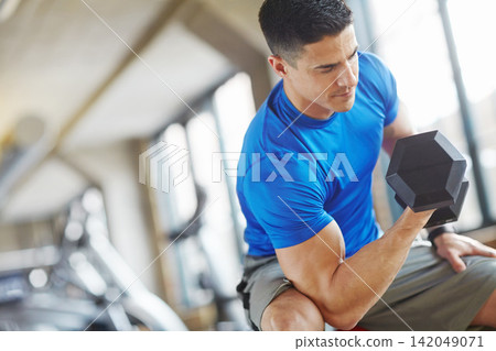 Man, weight lifting and strength in gym for fitness with dumbbell, workout challenge or strong muscle. Bodybuilder, pro athlete and training for bodybuilding routine or power exercise on mockup space Man, weight lifting and strength in gym for fitness with dumbbell, workout challenge or strong muscle. Bodybuilder, pro athlete and training for bodybuilding routine or power exercise on mockup space 142049071